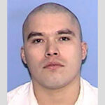 Death-row inmate sues for pastor's touch during execution